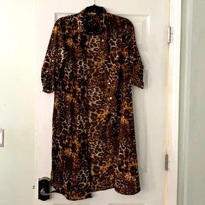 Leopard print blouse, splits on both sides, size small